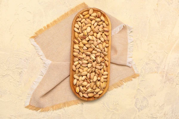 Napkin Board Tasty Pistachio Nuts Beige Background — Stock Photo, Image