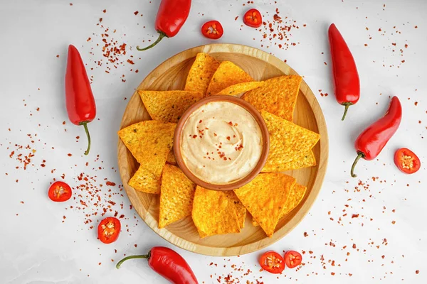 Plate Tasty Nachos Bowl Chipotle Sauce Light Background — Stock Photo, Image