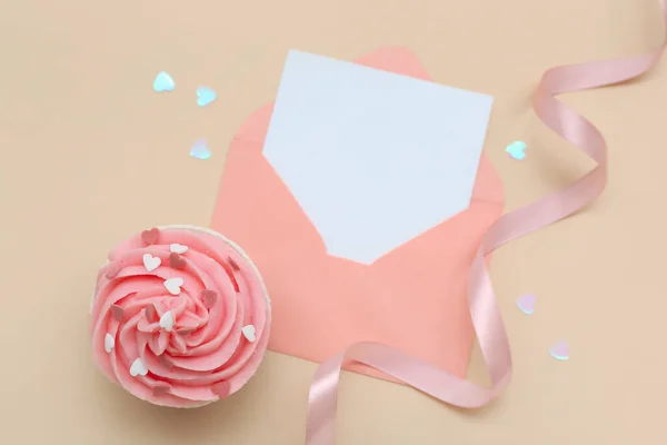 Tasty Cupcake Ribbon Envelope Blank Card Valentine Day Beige Background — Stock Photo, Image