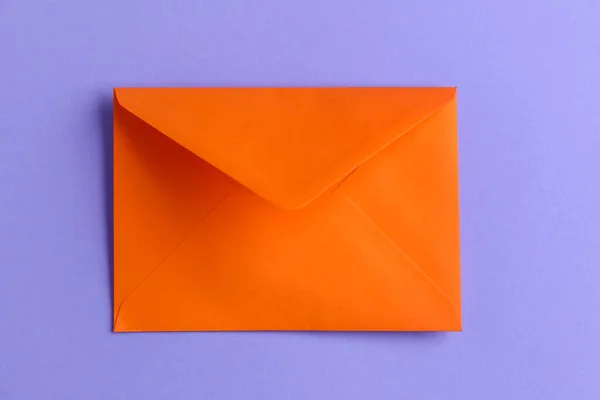 Orange Envelope Lilac Background — Stock Photo, Image