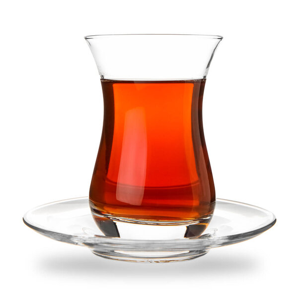 Glass of Turkish tea on white background