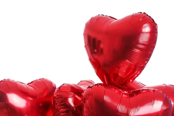 Heart-shaped balloons for Valentine\'s Day on white background, closeup