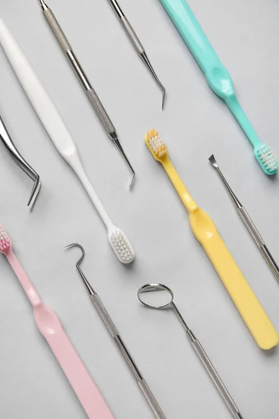 Dental Tools Toothbrushes Grey Background — Stock Photo, Image