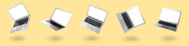 Collage of modern laptop with blank screen on yellow background