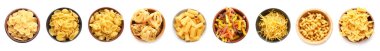 Collection of different types of Italian pasta in bowls on white background, top view