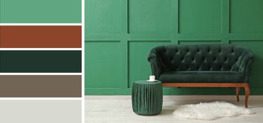 Comfortable sofa and pouf near green wall in living room. Different color patterns