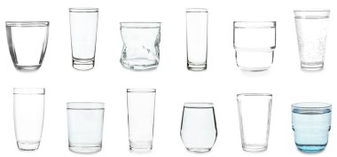 Many different glasses of water on white background