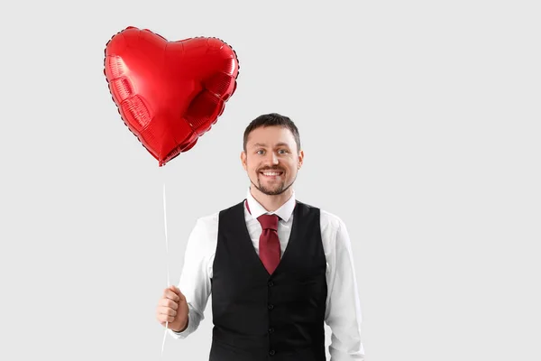 Handsome Man Heart Shaped Balloon Light Background Valentine Day Celebration — Stock Photo, Image