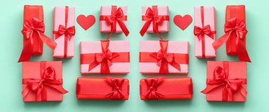 Many gifts for Valentine's Day celebration on turquoise background, top view