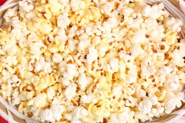 Basket of tasty popcorn, closeup