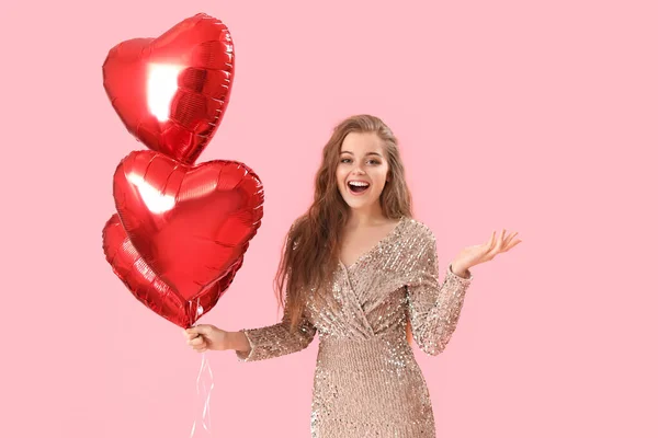 Happy Young Woman Heart Shaped Balloons Pink Background Valentine Day — Stock Photo, Image