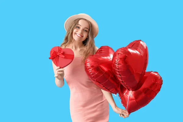 Happy Young Woman Heart Shaped Balloons Gift Blue Background Valentine — Fotografia de Stock