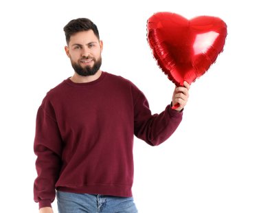 Young bearded man with balloon for Valentine's Day on white background