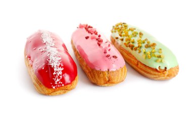 Various glazed eclairs isolated on white background