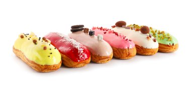 Various glazed eclairs isolated on white background
