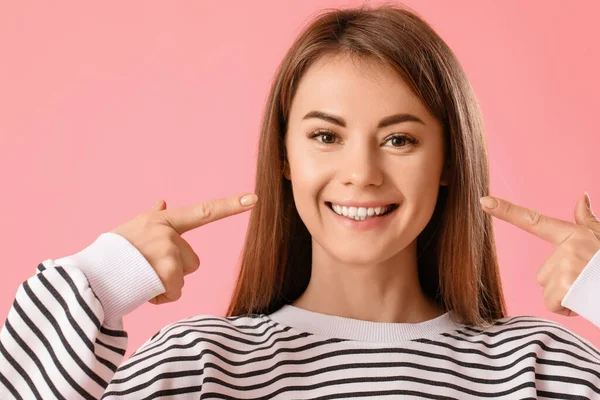 Young Woman Pointing Her Teeth Pink Background Closeup — Stock Photo, Image