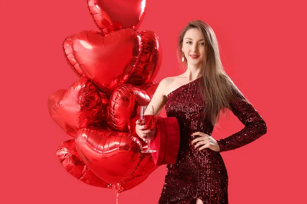 Young Woman Glass Wine Gift Balloons Red Background Valentine Day — Stock Photo, Image