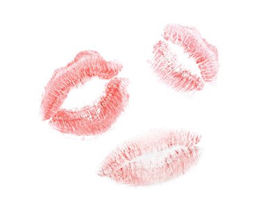 Red lipstick kiss marks on white background
