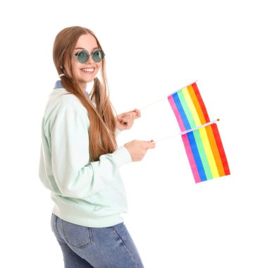 Beautiful young woman in sunglasses with LGBT flags on white background