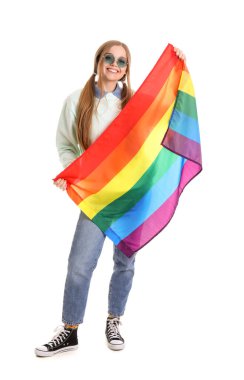 Beautiful young woman in sunglasses with LGBT flag on white background