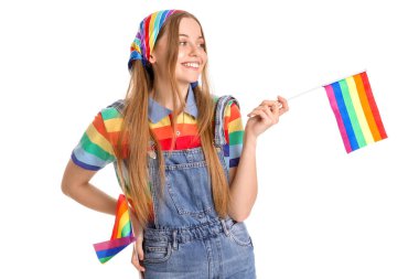 Beautiful young woman with LGBT flags on white background
