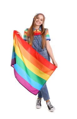 Beautiful young woman with LGBT flag on white background