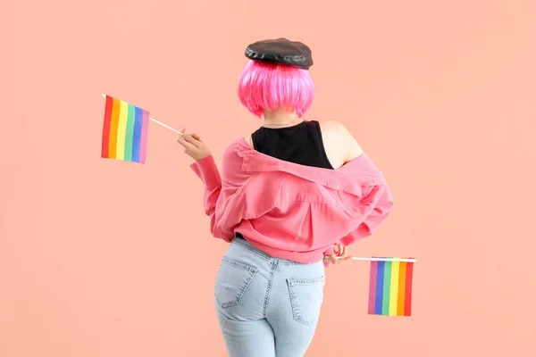 Young Woman Lgbt Flags Pink Background Back View — Stock Photo, Image
