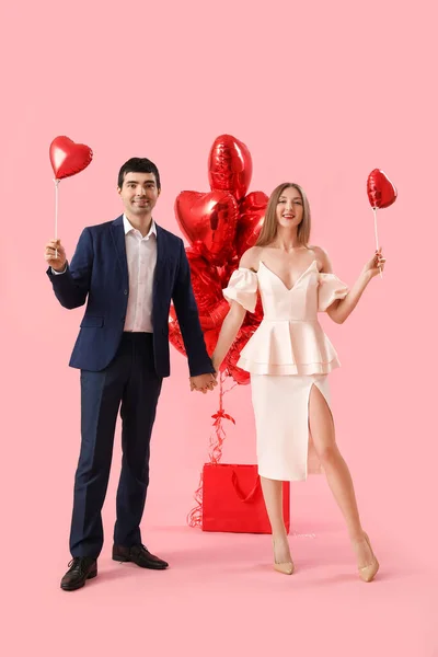 Young Couple Love Balloons Pink Background Valentine Day Celebration — Stock Photo, Image
