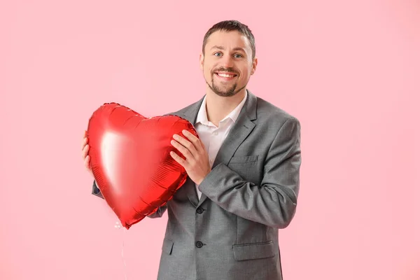 Handsome Man Heart Shaped Balloon Pink Background Valentine Day Celebration — Stock Photo, Image