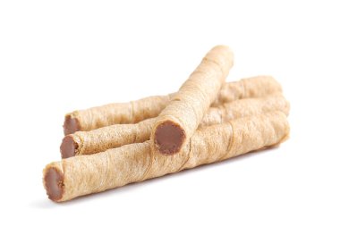 Tasty wafer rolls with boiled condensed milk isolated on white background