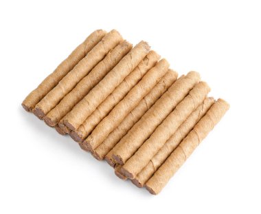 Heap of tasty wafer rolls isolated on white background