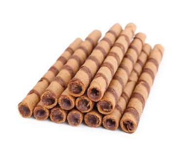 Heap of tasty wafer rolls isolated on white background