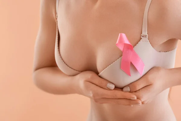Young Woman Underwear Pink Ribbon Beige Background Breast Cancer Awareness — Stock Photo, Image