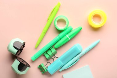 Set of stationery on pink background