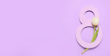 Creative greeting card for International Women's Day on lilac background with space for text