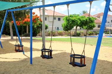 View of swings on playground