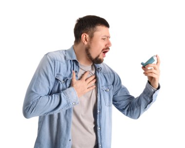 Sick man with inhaler on white background