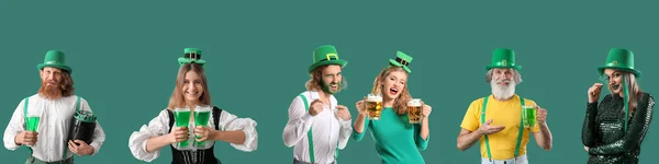 Group of happy people with tasty beer celebrating St. Patrick\'s Day on green background