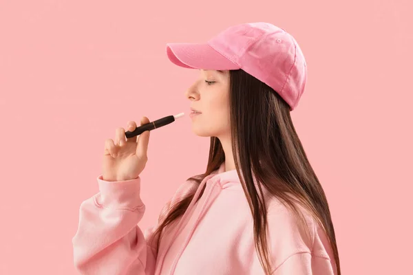 Young Woman Cap Disposable Electronic Cigarette Pink Background Closeup — Stock Photo, Image