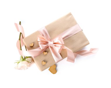 Gift box with hearts and roses for Valentine's Day on white background