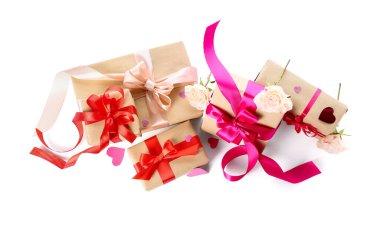 Gift boxes with hearts and roses for Valentine's Day on white background