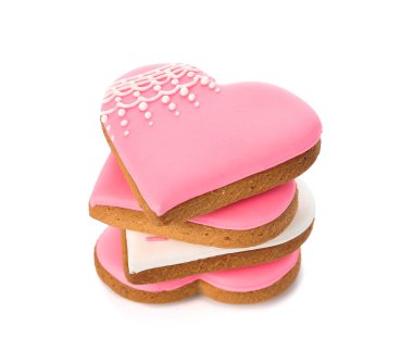 Stack of sweet heart shaped cookies on white background. Valentine's Day celebration