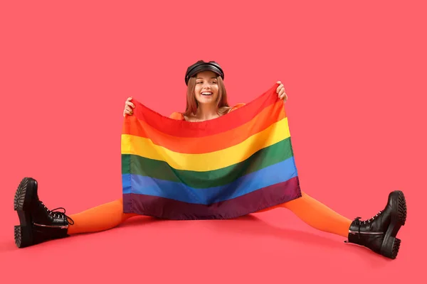 Beautiful Young Woman Hat Lgbt Flag Sitting Red Background — Foto Stock