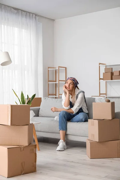 Dreaming Young Woman Sitting Sofa Living Room Moving Day — Stock Photo, Image