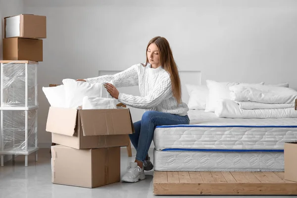 Young Woman Pillows Cardboard Boxes Bedroom Moving Day — Stock Photo, Image