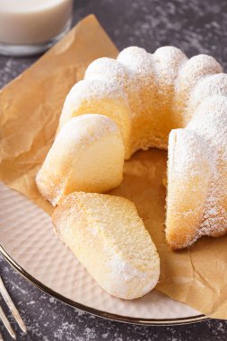 Plate with delicious cake on grunge background, closeup