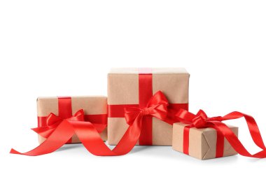 Gift boxes with red bows for Valentine's Day on white background