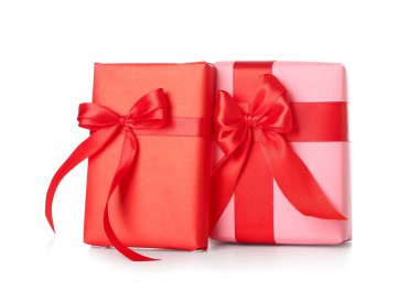 Gift boxes with red ribbon on white background. Valentine's Day celebration
