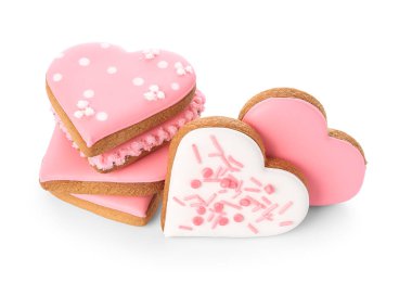 Heap of tasty heart shaped cookies isolated on white background. Valentine's Day celebration