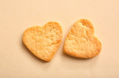 Delicious heart shaped cookies on color background. Valentines Day celebration